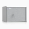 sejf-meblowy-adorf-331001.01-zamkniety-jasnoszary-na-klucz.webp